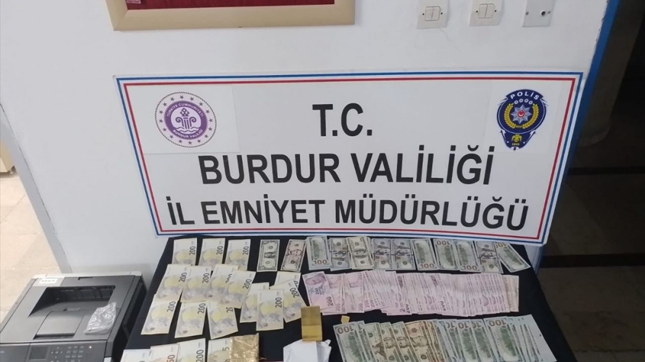 Burdur'da park halindeki araçtan döviz ve altın çaldığı iddia edilen zanlı tutuklandı