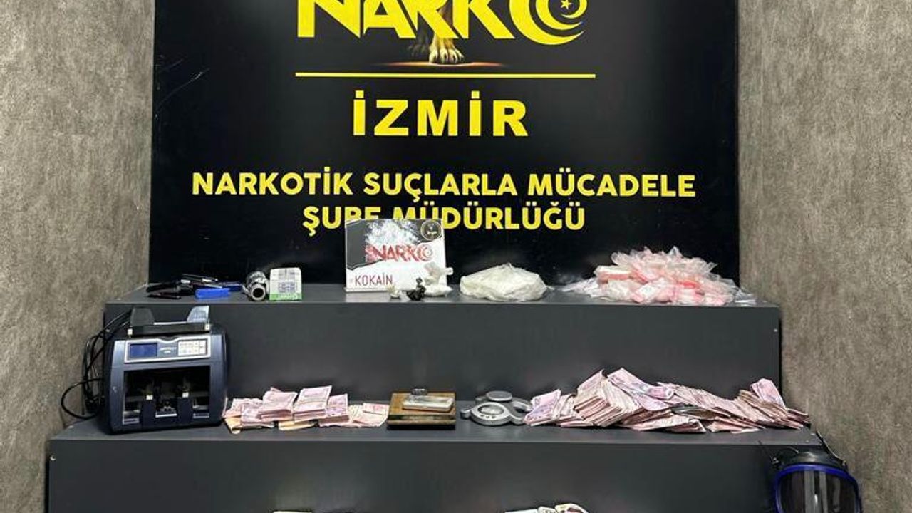 İzmir'de uyuşturucu baskınında 8 milyon lira değerinde döviz ele geçirildi